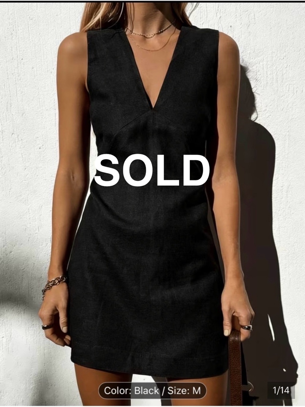 Sleeveless Black V-Neck Mini Dress
